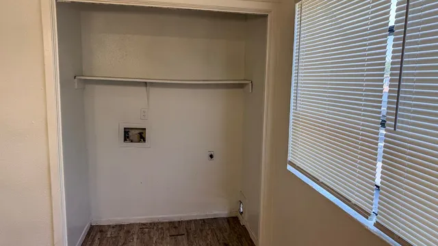 a view of a room with rack on the wall