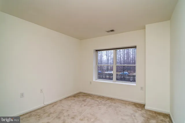 a bathroom with a sink toilet vanity and shower