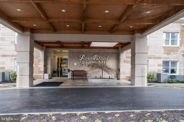 a view of a building with entrance gate
