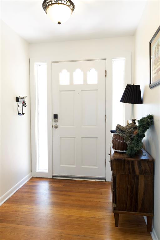 2910 Southwest 1st Avenue Gainesville, FL 32607 - Photo 5 of 16 a view of a livingroom with furniture and wooden floor