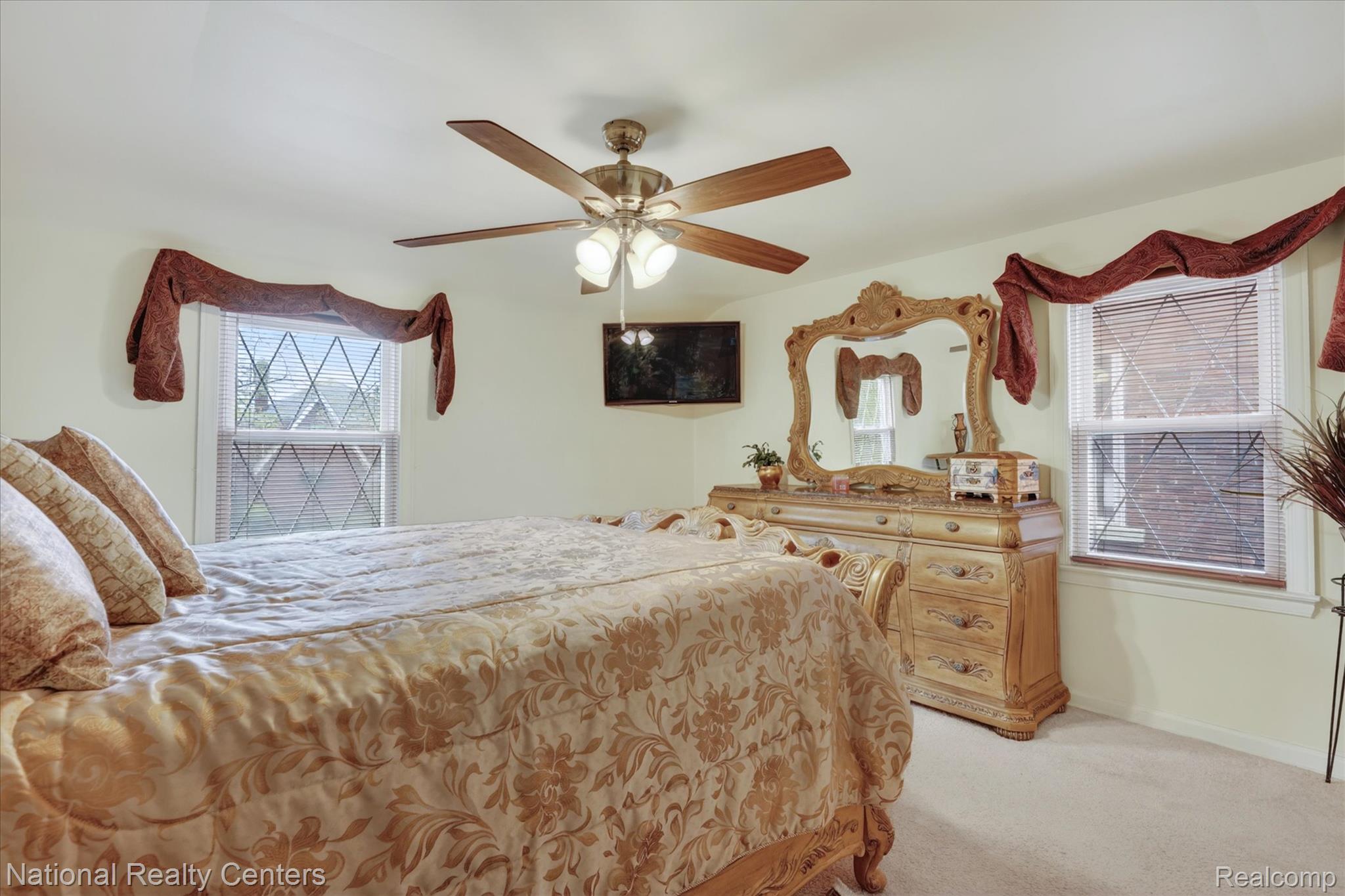 3956 Harvard Road Detroit, MI 48224 - Photo 24 of 44 Bedroom with light carpet and ceiling fan