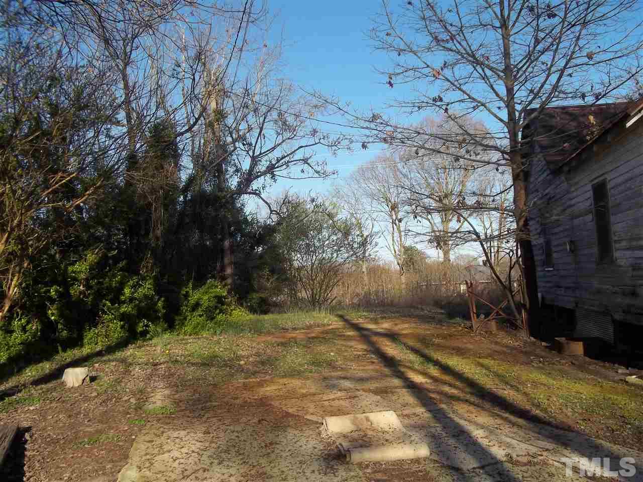 1314 Hardwood Road Roxboro, NC 27573 - Photo 3 of 6 a view of a yard with trees
