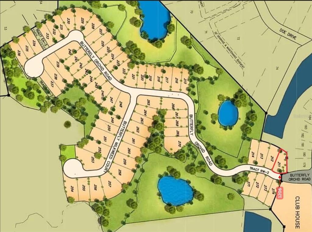 1206 Butterfly Orchid Road Davenport, FL 33837 - Photo 2 of 3 a bathroom with a sink and mirror with bathtub