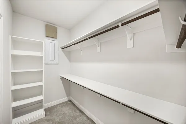 a view of an empty walk in closet