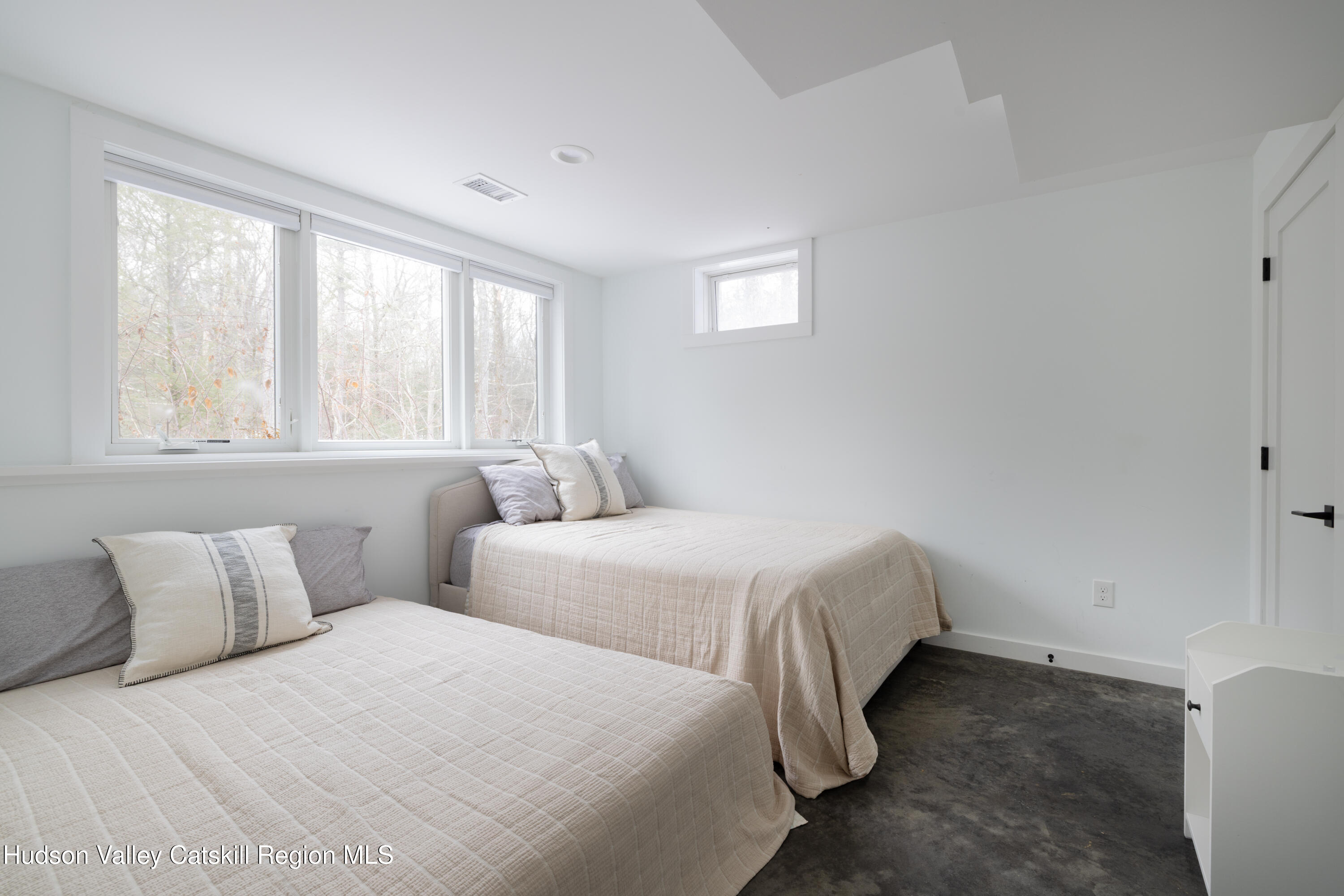 158 Rivka Road Saugerties, NY 12477 - Photo 20 of 35 a bedroom with two beds and a window