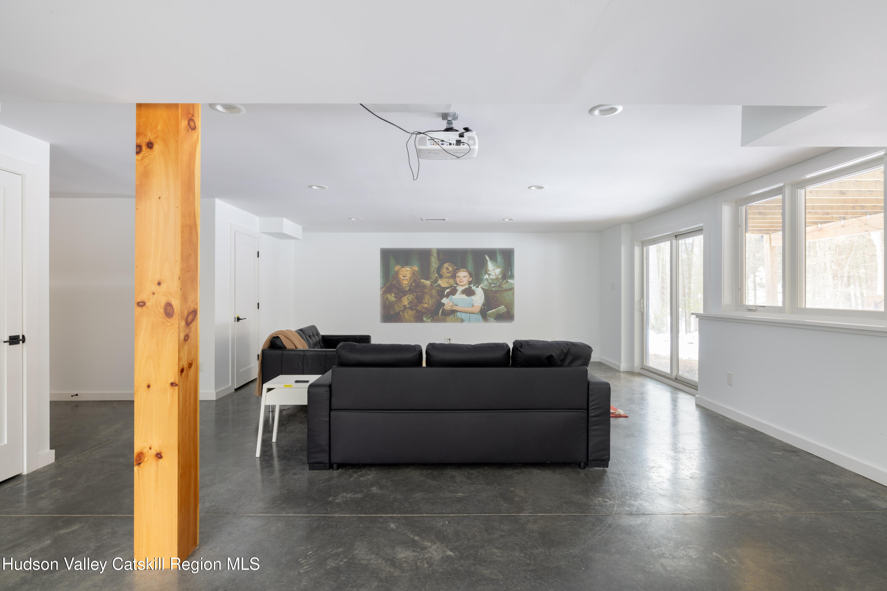 158 Rivka Road Saugerties, NY 12477 - Photo 22 of 35 a living room with couches and painted walls next to a window