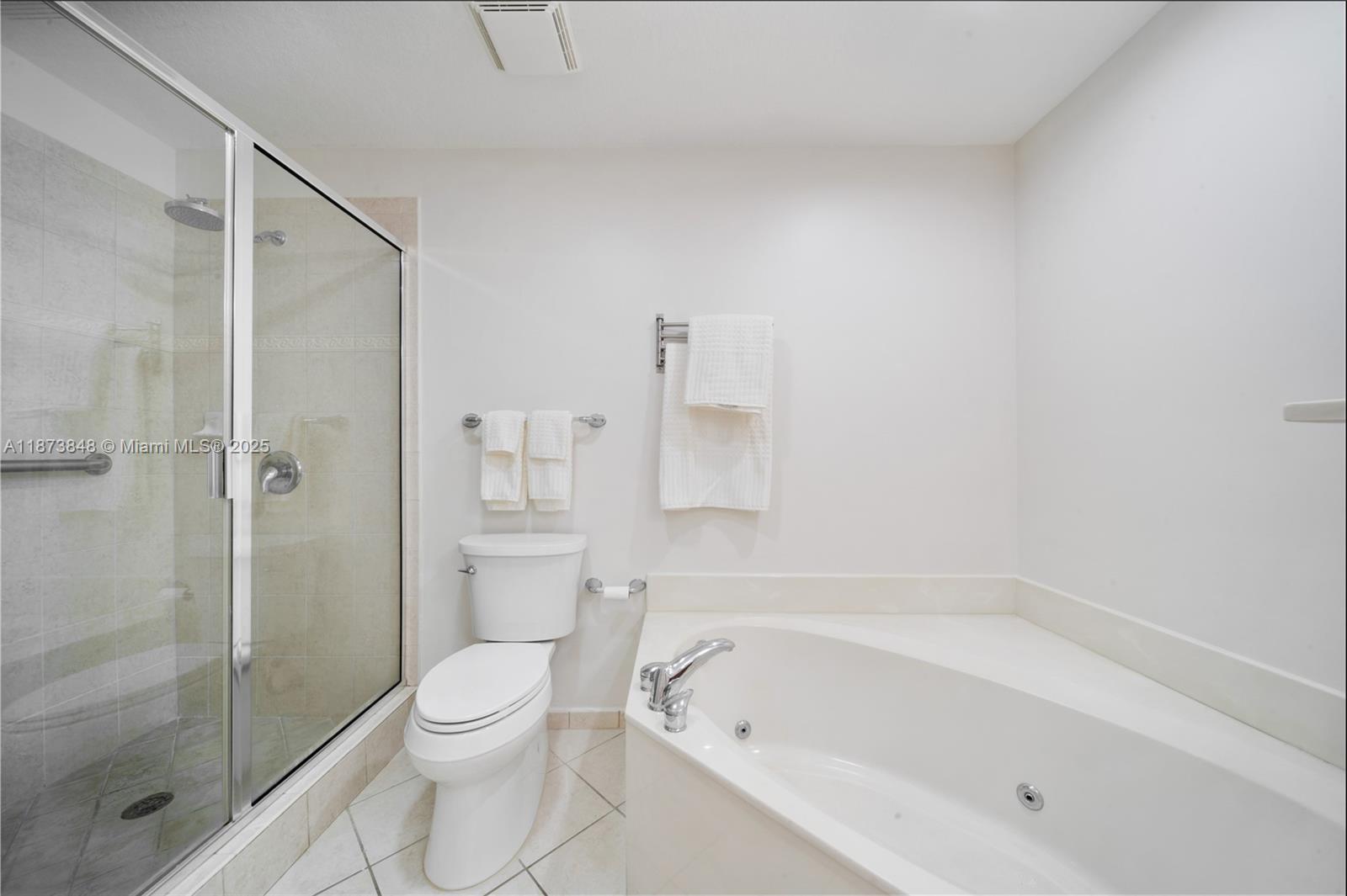 9021 Southwest 94th Street, Unit 310 Miami, FL 33176 - Photo 22 of 41 a bathroom with a bathtub toilet and shower