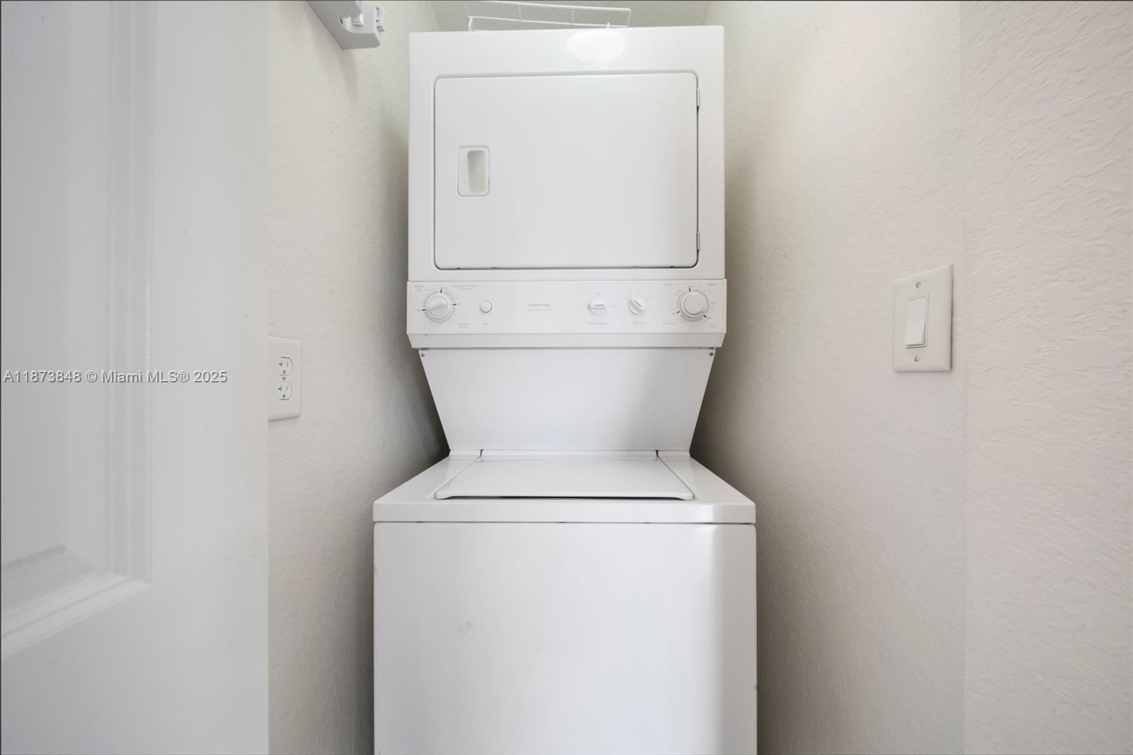 9021 Southwest 94th Street, Unit 310 Miami, FL 33176 - Photo 27 of 41 a utility room with dryer and washer