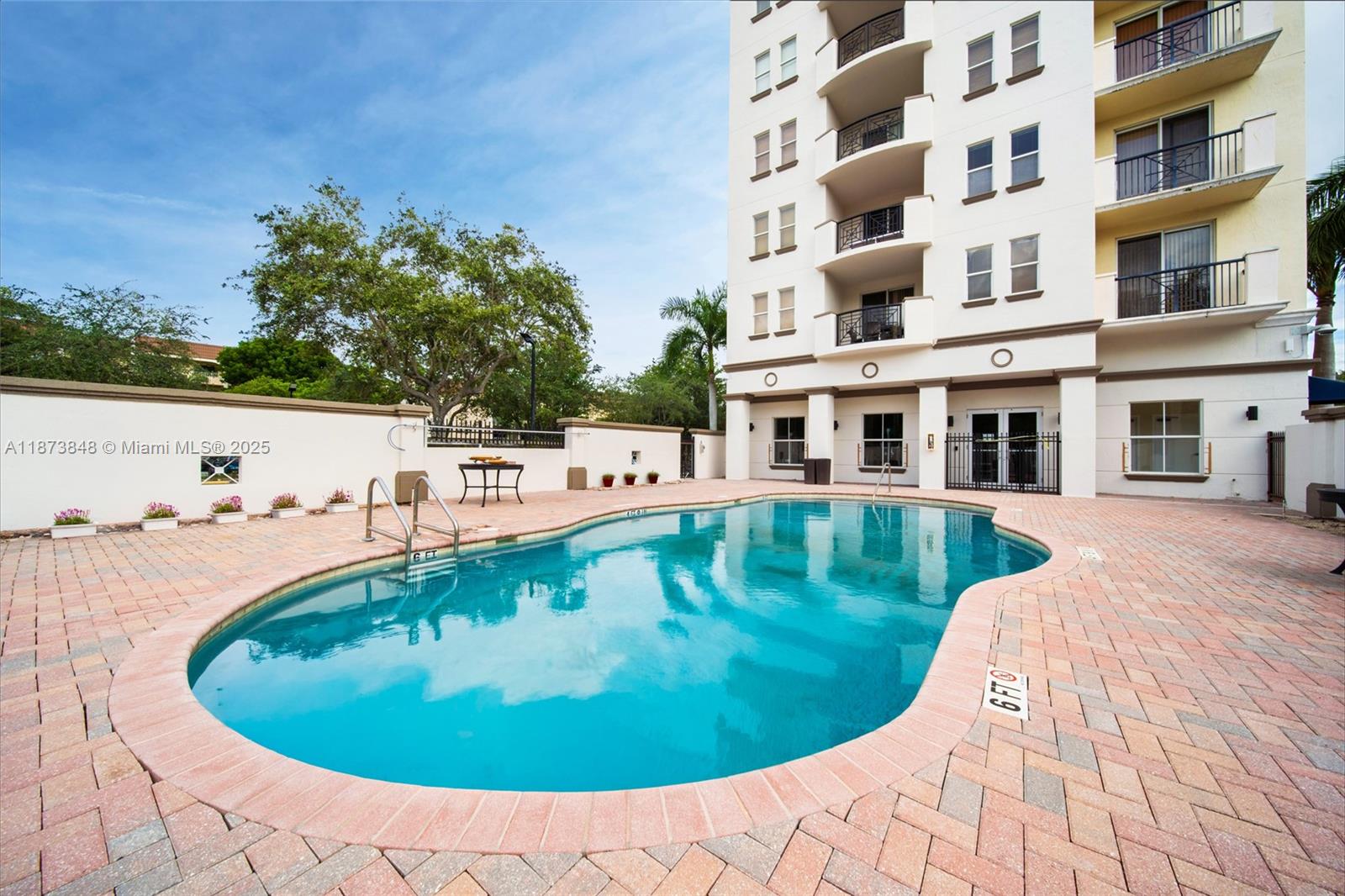 9021 Southwest 94th Street, Unit 310 Miami, FL 33176 - Photo 29 of 41 a view of a swimming pool with an outdoor space
