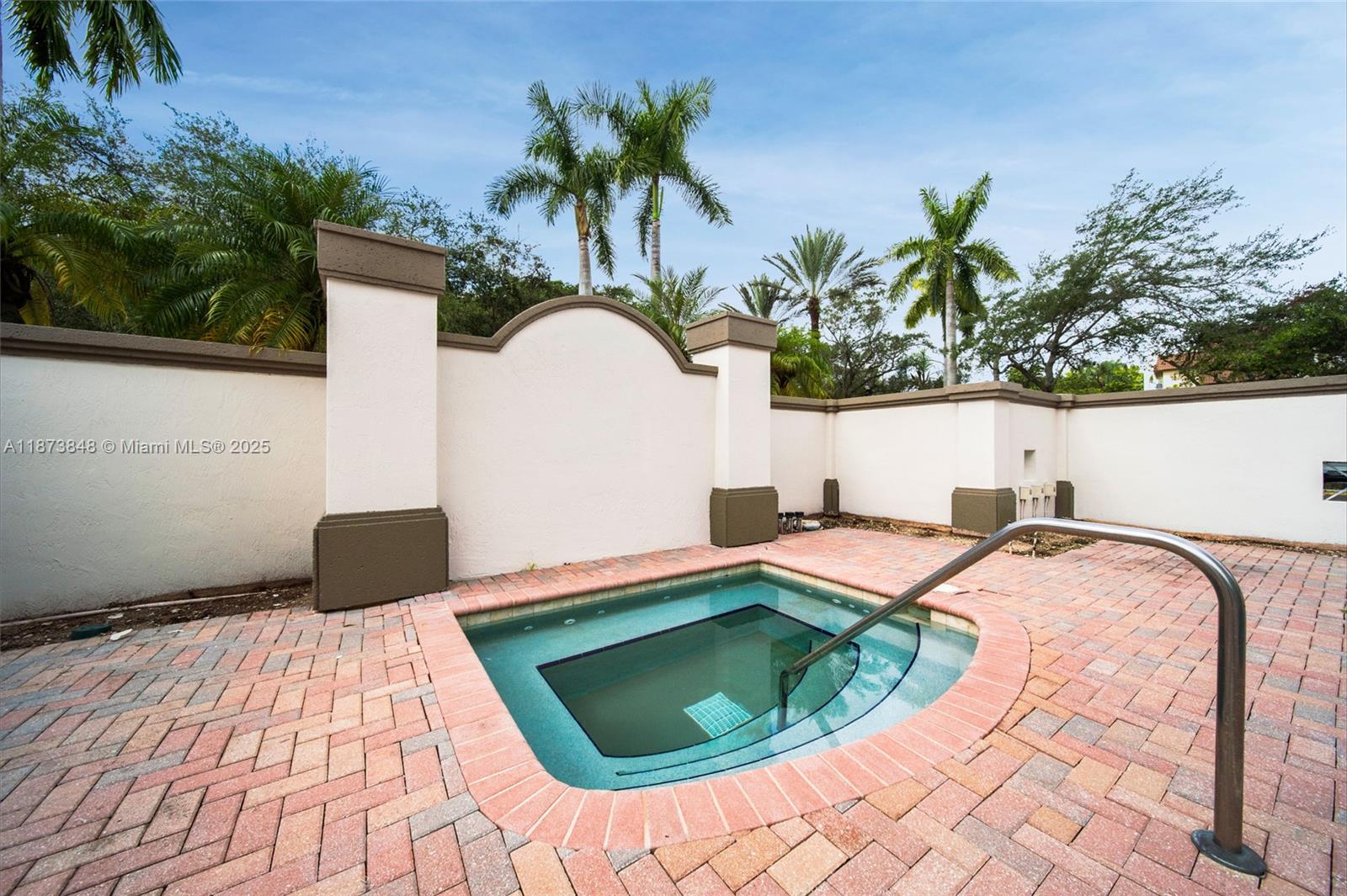 9021 Southwest 94th Street, Unit 310 Miami, FL 33176 - Photo 30 of 41 a view of a swimming pool with a lounge chair