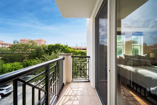 a view of balcony with furniture