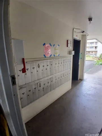 a bedroom with furniture and baby crib