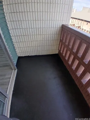 a view of a city street from a balcony