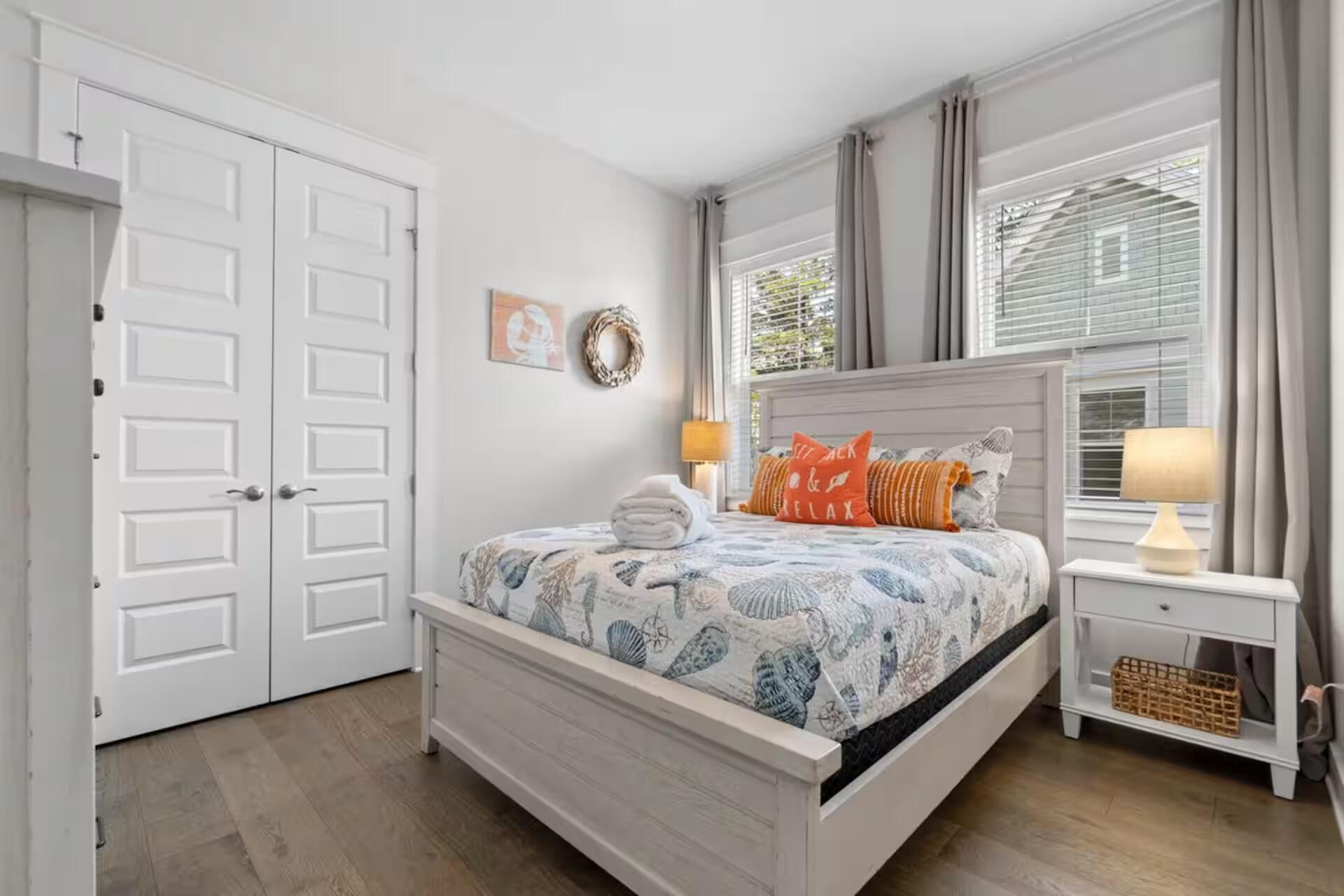 146 East E Pine, Unit B Inlet Beach, FL 32461 - Photo 22 of 47 a bedroom with a bed and window