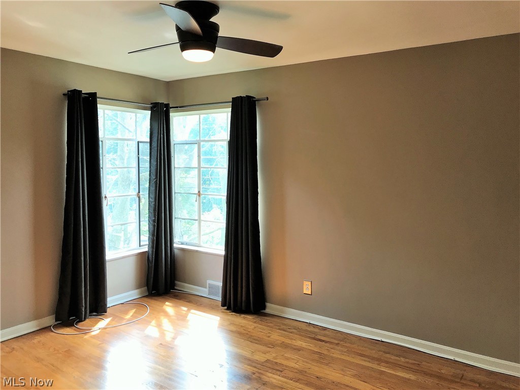 19860 Lorain Road, Unit 6 Cleveland, OH 44126 - Photo 9 of 14 Master bedroom has ceiling fan with remote control