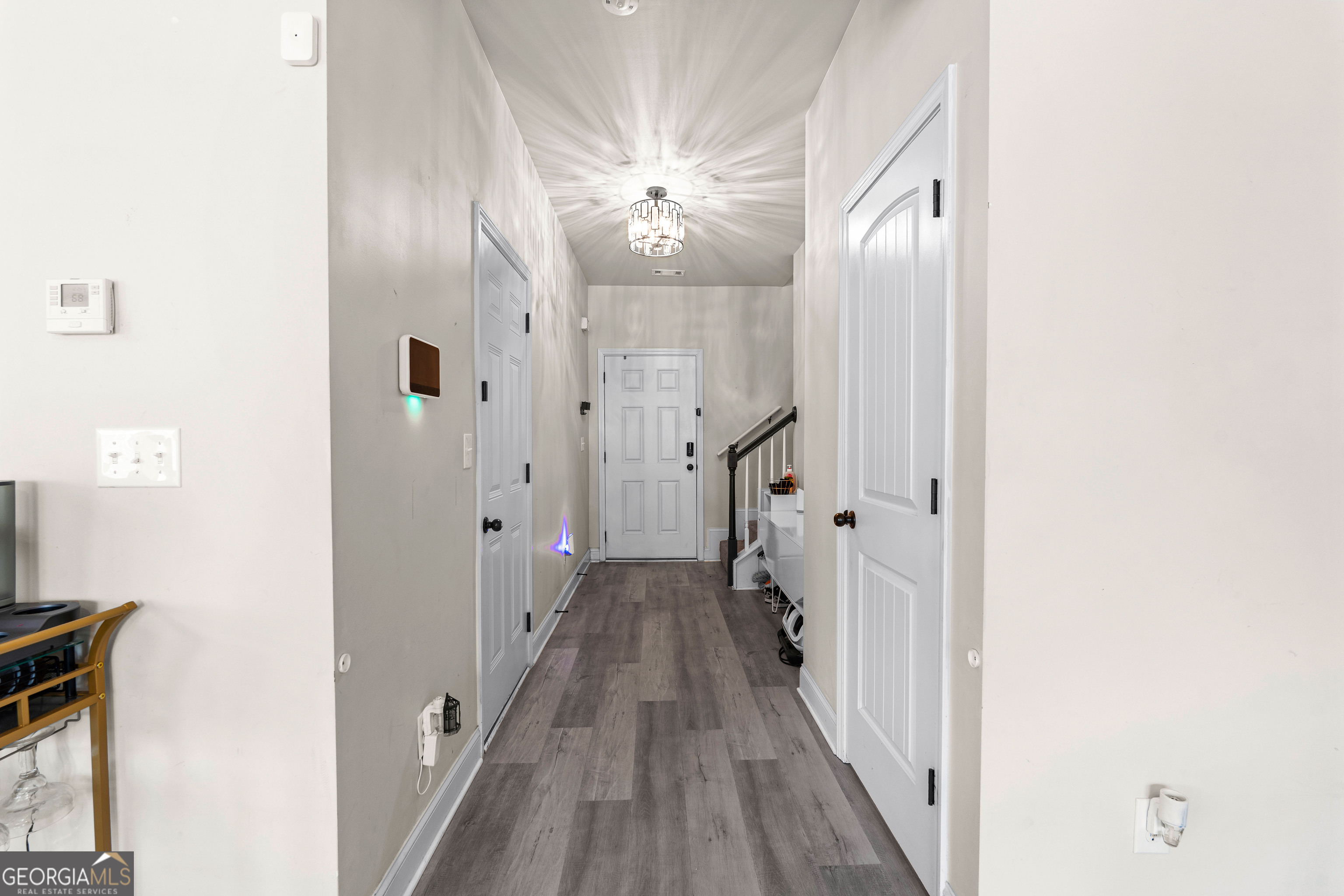112 Truman Court Jackson, GA 30233 - Photo 18 of 42 a view of a hallway with wooden floor