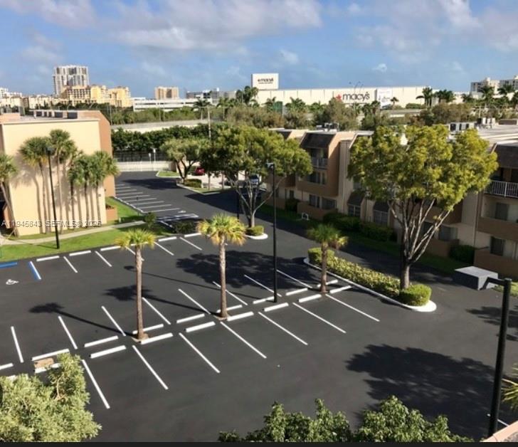 7743 Southwest 86th Street, Unit D129 Miami, FL 33143 - Photo 12 of 17 an aerial view of residential houses with outdoor space