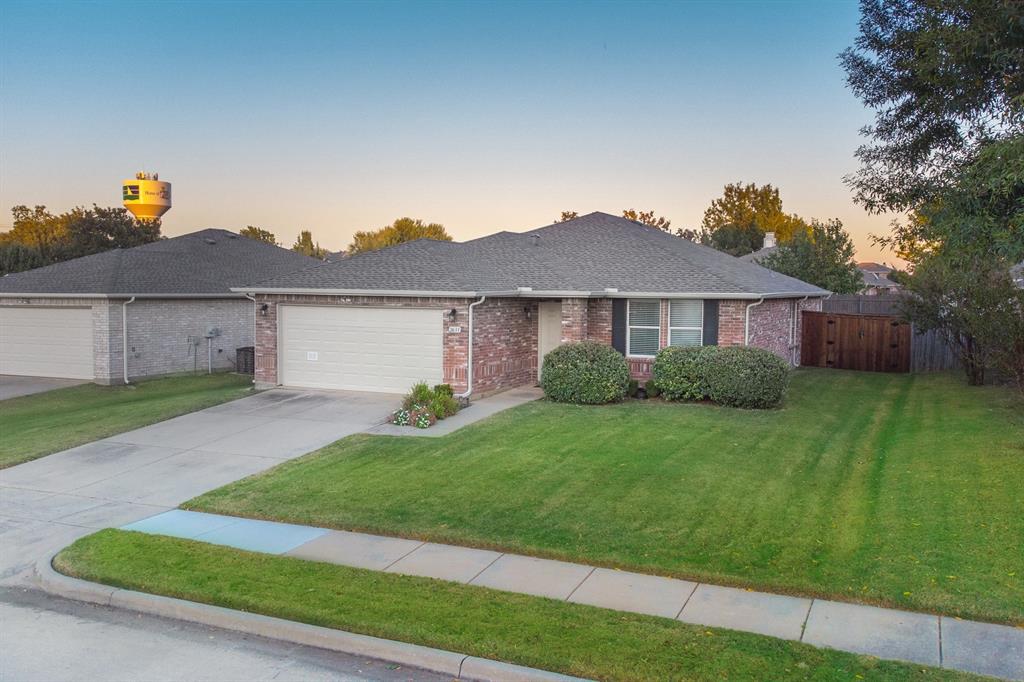2633 Rockport Lane Little Elm, TX 75068 - Photo 30 of 39 a front view of a house with a yard
