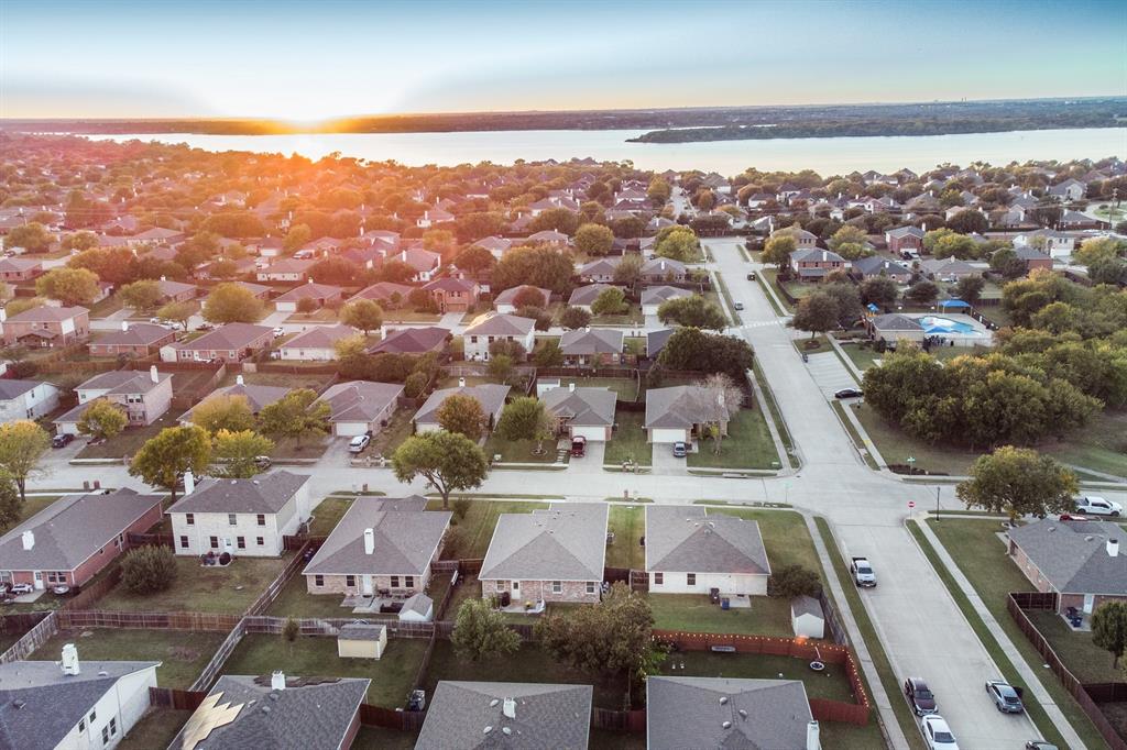 2633 Rockport Lane Little Elm, TX 75068 - Photo 34 of 39 an aerial view of a residential apartment building with a city view