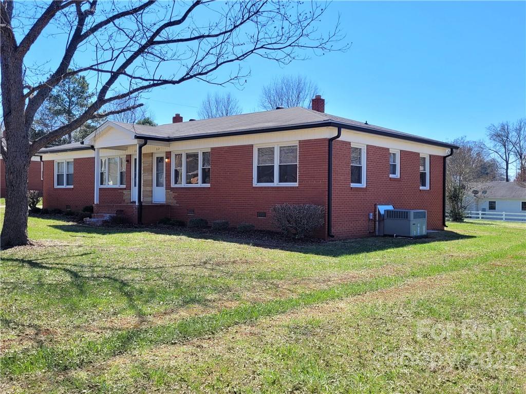 2123 Oakdale Road Charlotte, NC 28216 - Photo 12 of 13 a house view with a garden space