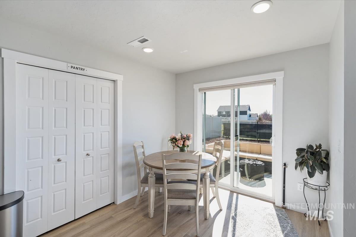 11359 West Langit Street Star, ID 83669 - Photo 10 of 39 Dining space with light wood-style flooring and recessed lighting