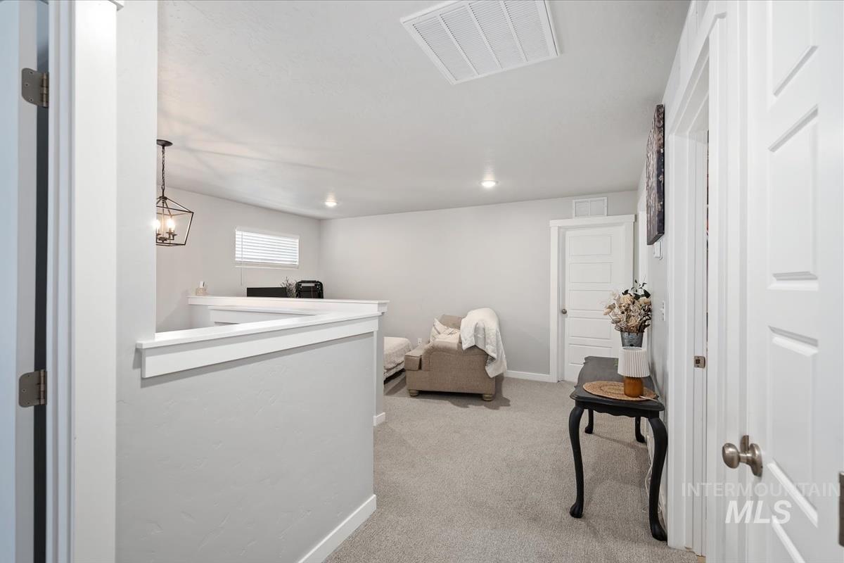 11359 West Langit Street Star, ID 83669 - Photo 16 of 39 Office area with light carpet and recessed lighting