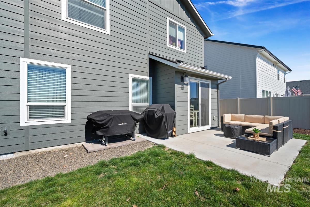 11359 West Langit Street Star, ID 83669 - Photo 31 of 39 Rear view of house featuring an outdoor hangout area and a patio