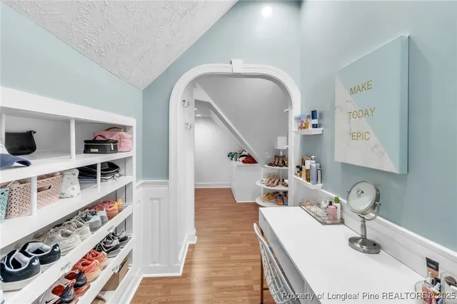 a view of a workspace with furniture and toys