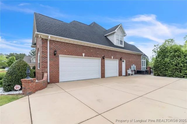 a front view of house with garage