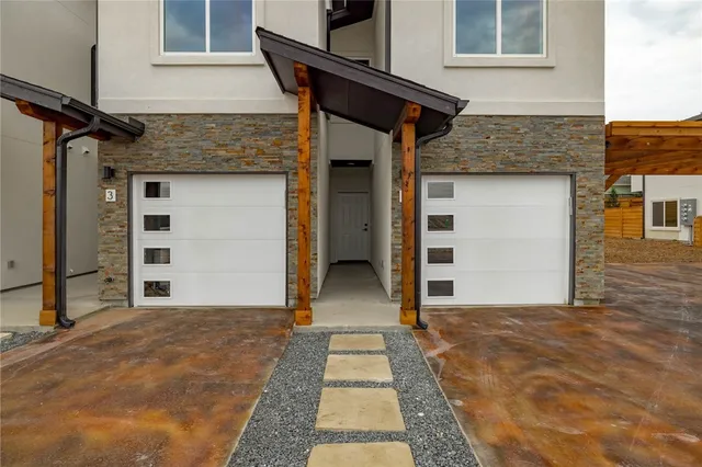a view of a house with a door and a window
