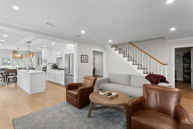 a kitchen with a sink and a stove top oven