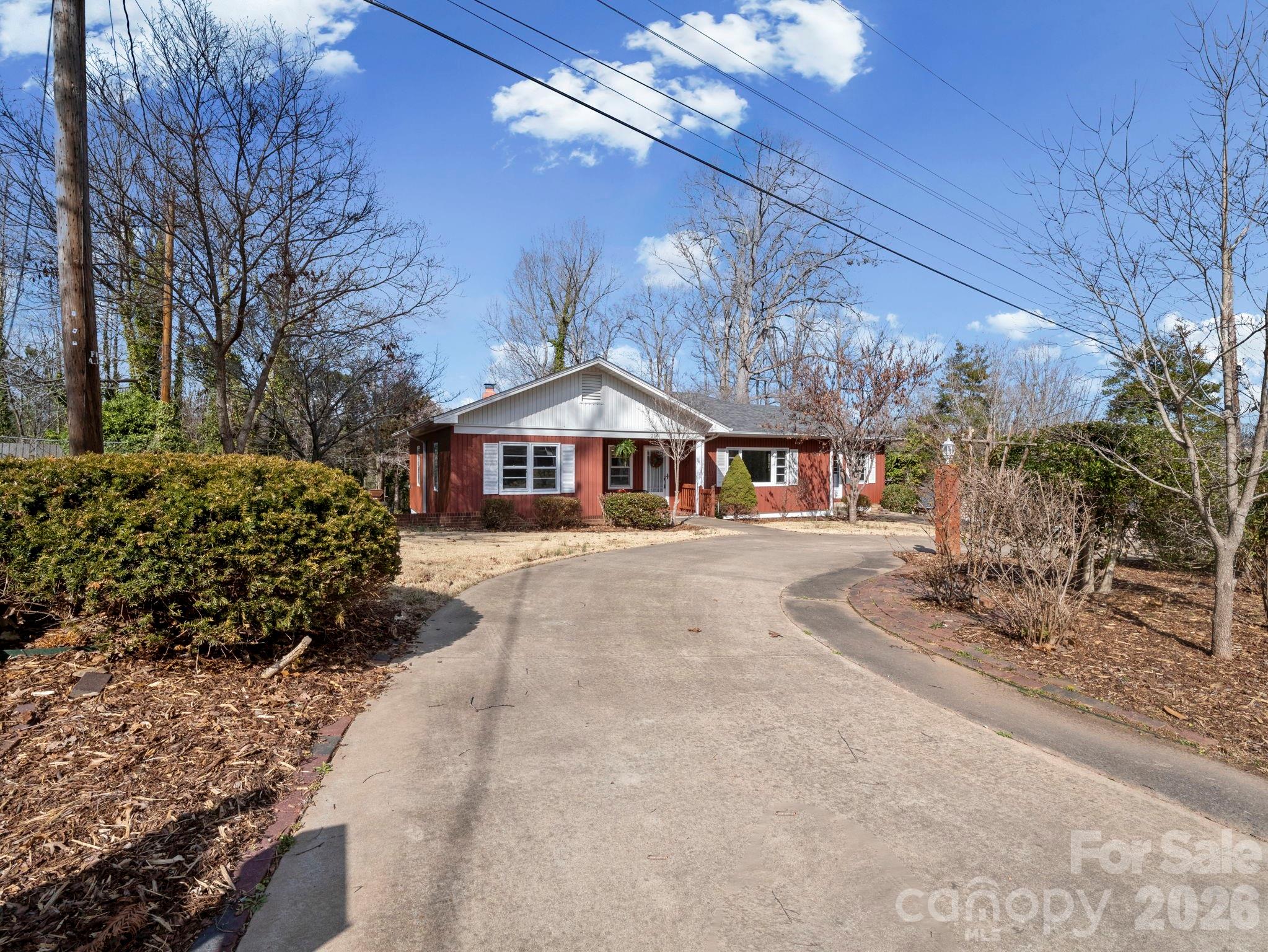 204 West Fernwood Drive Rutherfordton, NC 28139 - Photo 2 of 34 a front view of a house with a yard