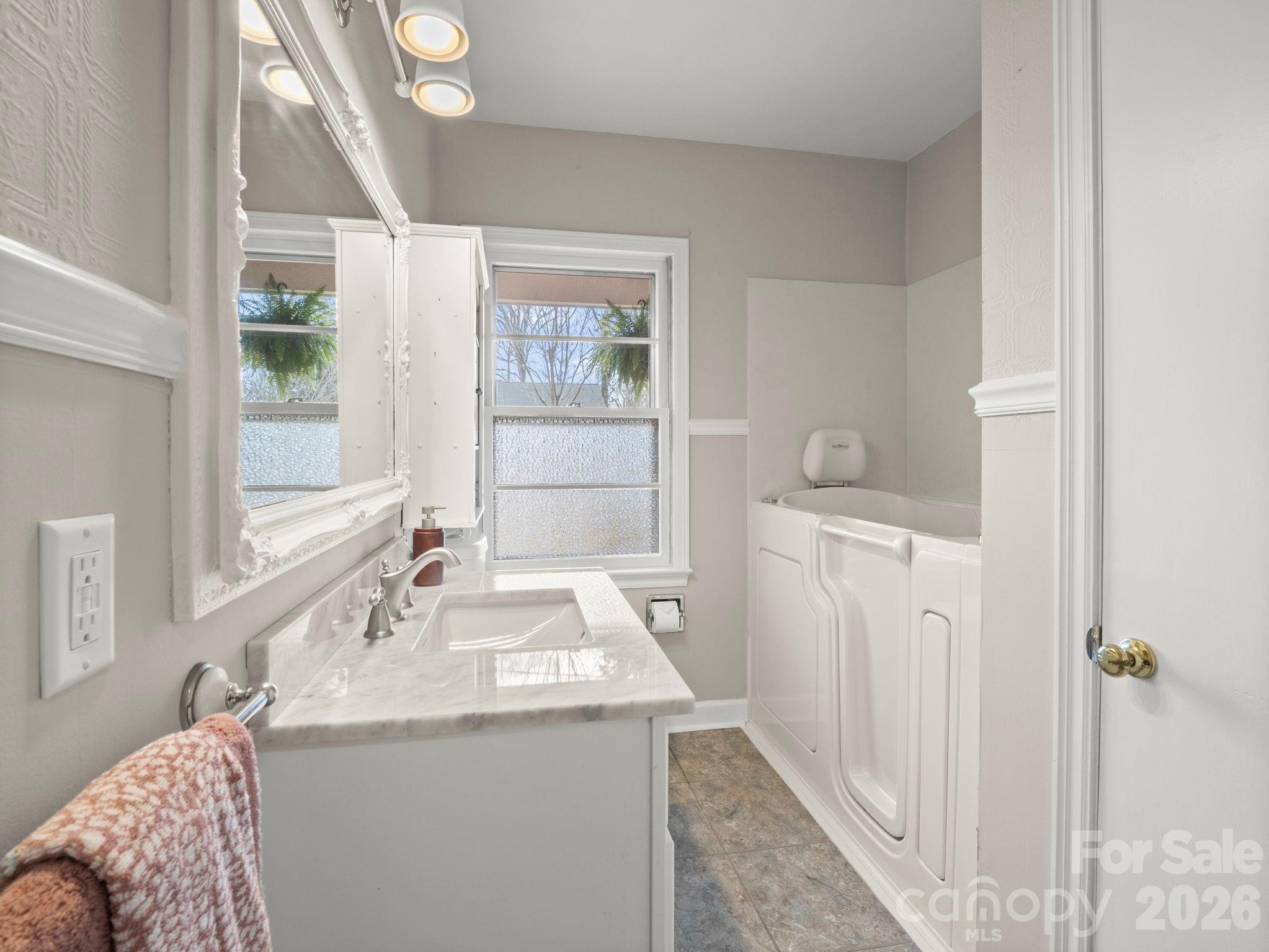 204 West Fernwood Drive Rutherfordton, NC 28139 - Photo 23 of 34 a bathroom with a sink and a mirror