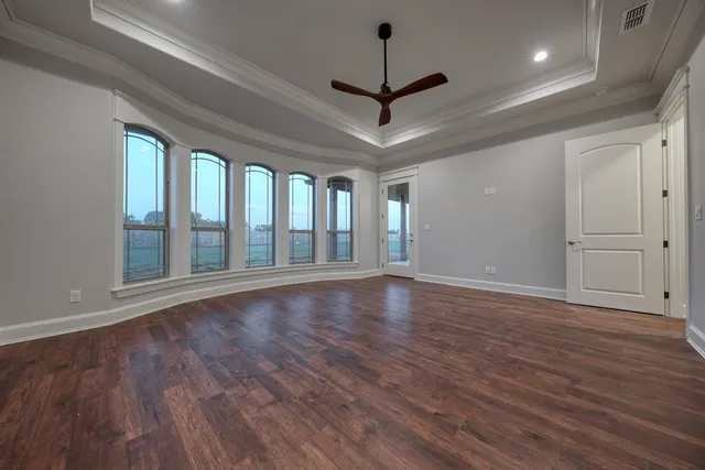 a view of room window and wooden floor