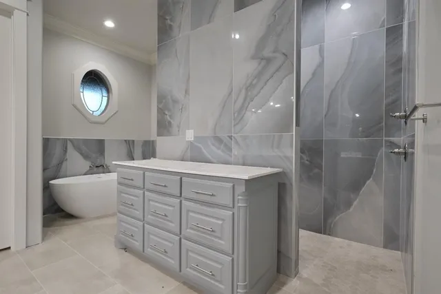 a bathroom with a double vanity sink a toilet and a mirror