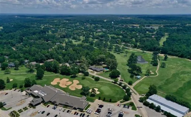 a view of a garden with a lake