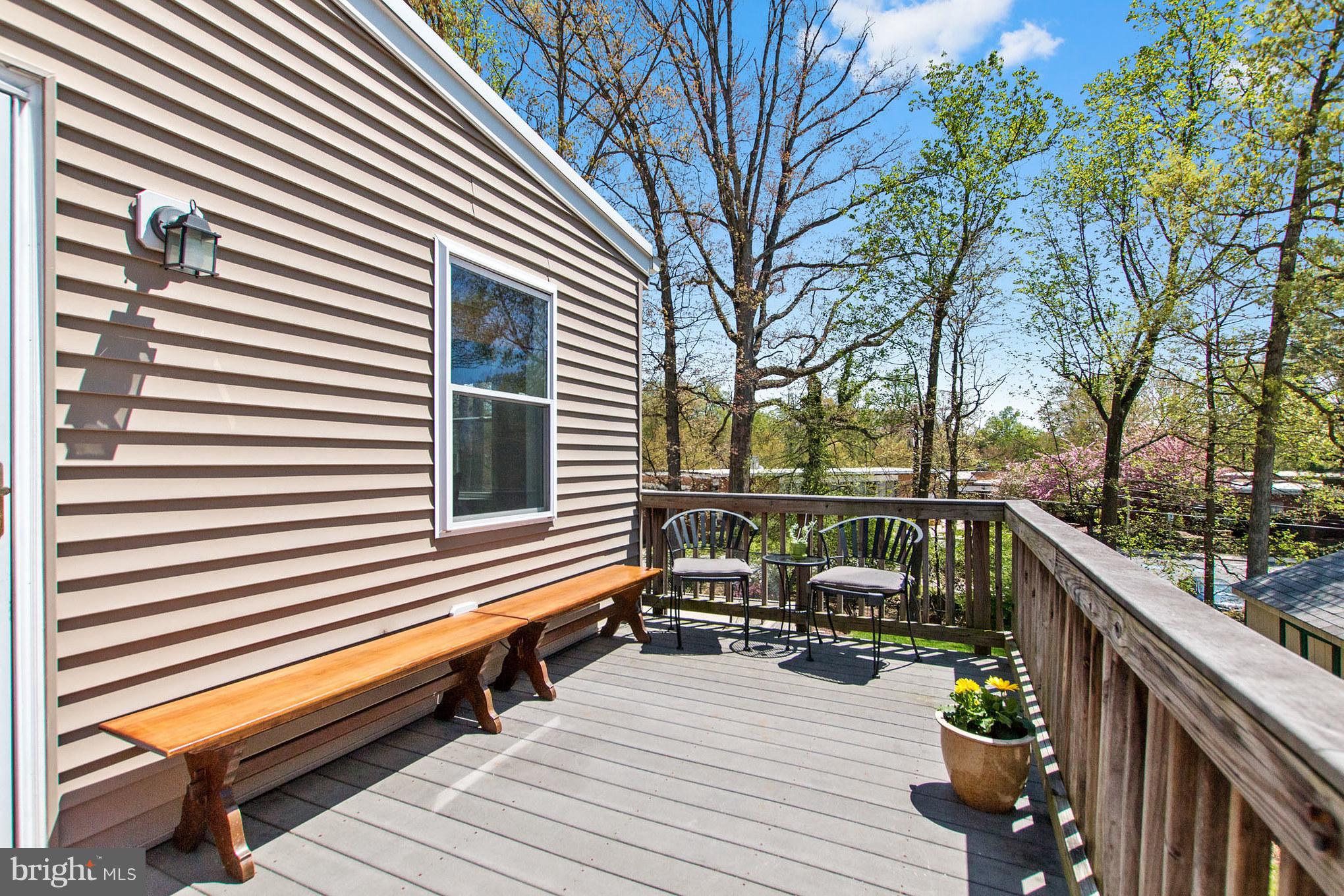 916 Snure Road Silver Spring, MD 20901 - Photo 13 of 30 Step out of Family Room onto Sunny Deck