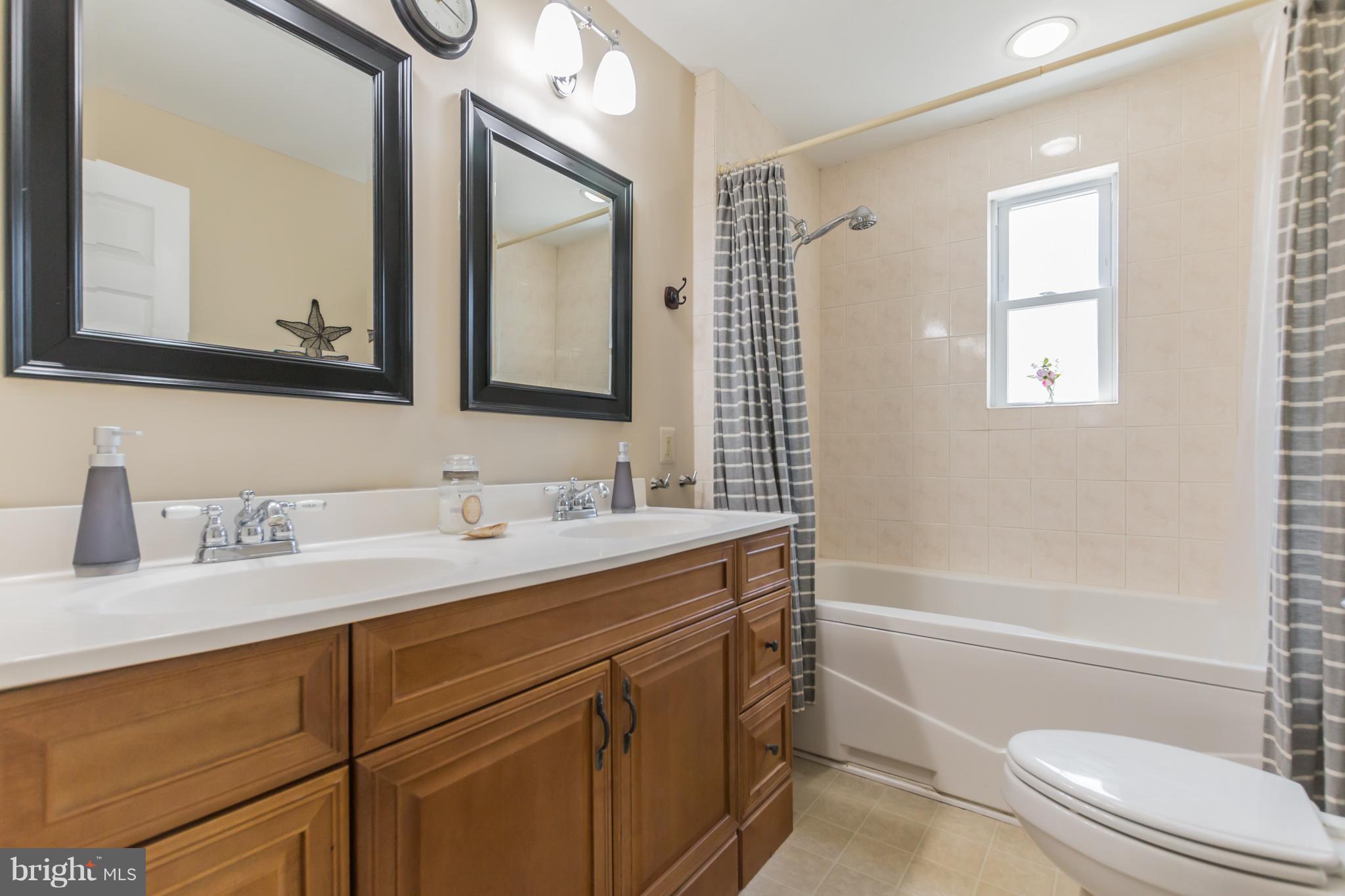 916 Snure Road Silver Spring, MD 20901 - Photo 16 of 30 Main Level Bathroom with Double Vanity