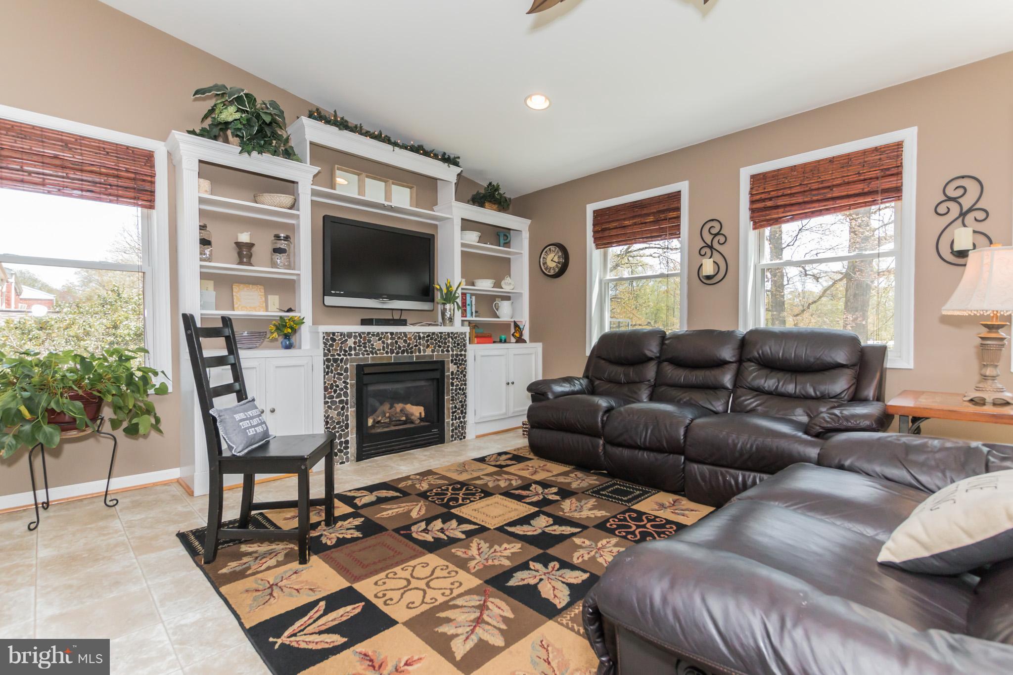 916 Snure Road Silver Spring, MD 20901 - Photo 10 of 30 Gas Fireplace Warms Great Space to Entertain