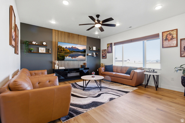 3902 West 825 North West Point, UT 84015 - Photo 24 of 49 Living area featuring a ceiling fan, wood finished floors, and recessed lighting