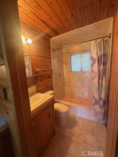 24027 Lakeview Drive Crestline, CA 92325 - Photo 12 of 15 a bathroom with a sink a toilet and shower