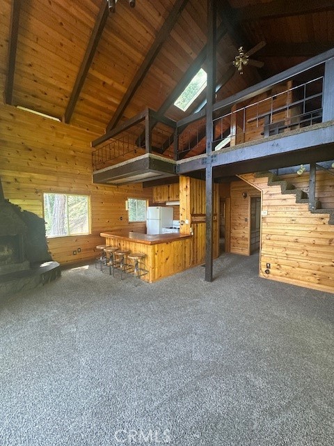 24027 Lakeview Drive Crestline, CA 92325 - Photo 3 of 15 a view of an empty room with a fireplace