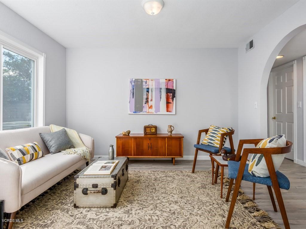 23446 Vía Barra Valencia, CA 91355 - Photo 12 of 42 a living room with furniture and a couch