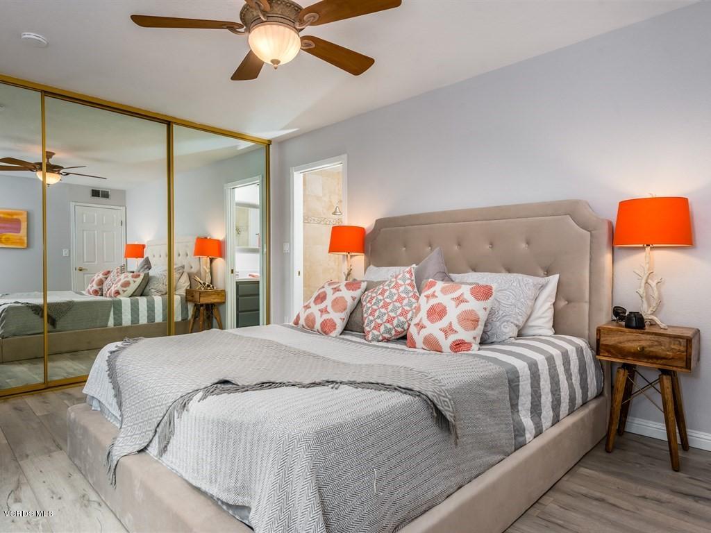 23446 Vía Barra Valencia, CA 91355 - Photo 15 of 42 a bedroom with a bed and window