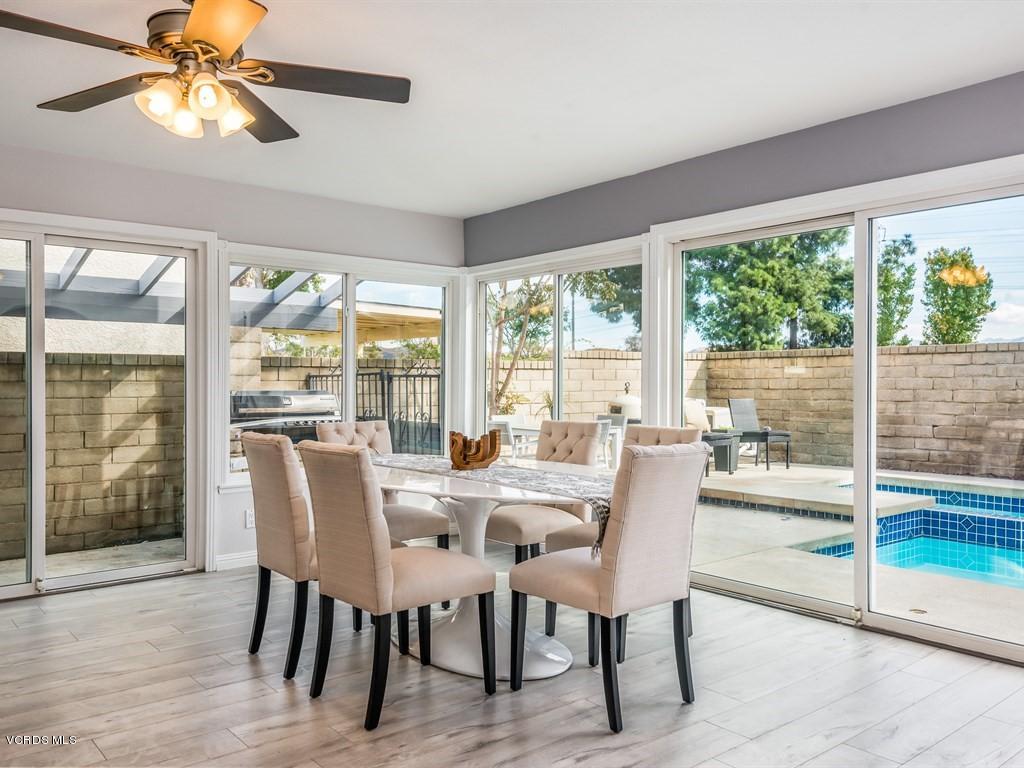 23446 Vía Barra Valencia, CA 91355 - Photo 2 of 42 a view of a dining room with furniture window and outside view