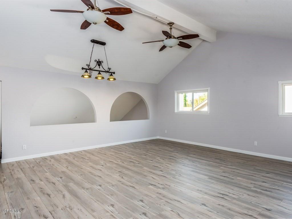 23446 Vía Barra Valencia, CA 91355 - Photo 37 of 42 a view of an empty room with a window