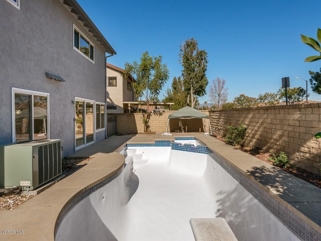 23446 Vía Barra Valencia, CA 91355 - Photo 42 of 42 a view of a swimming pool with a patio