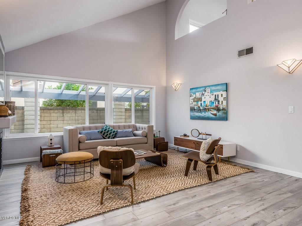 23446 Vía Barra Valencia, CA 91355 - Photo 5 of 42 a living room with furniture and a large window