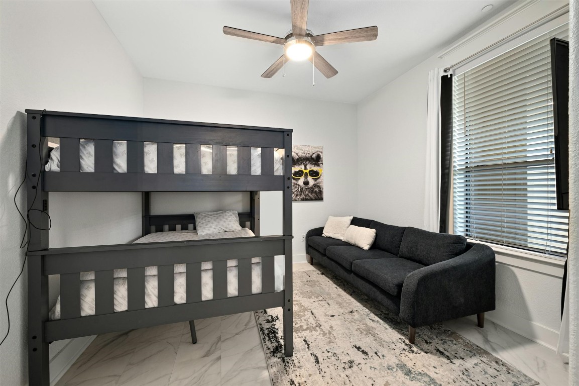 17800 Edgewood Way, Unit 202 Jonestown, TX 78645 - Photo 22 of 40 a living room with furniture and a window