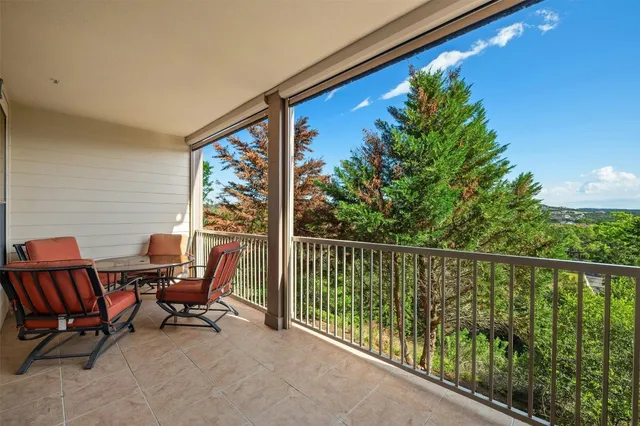 a view of a two chair in the balcony